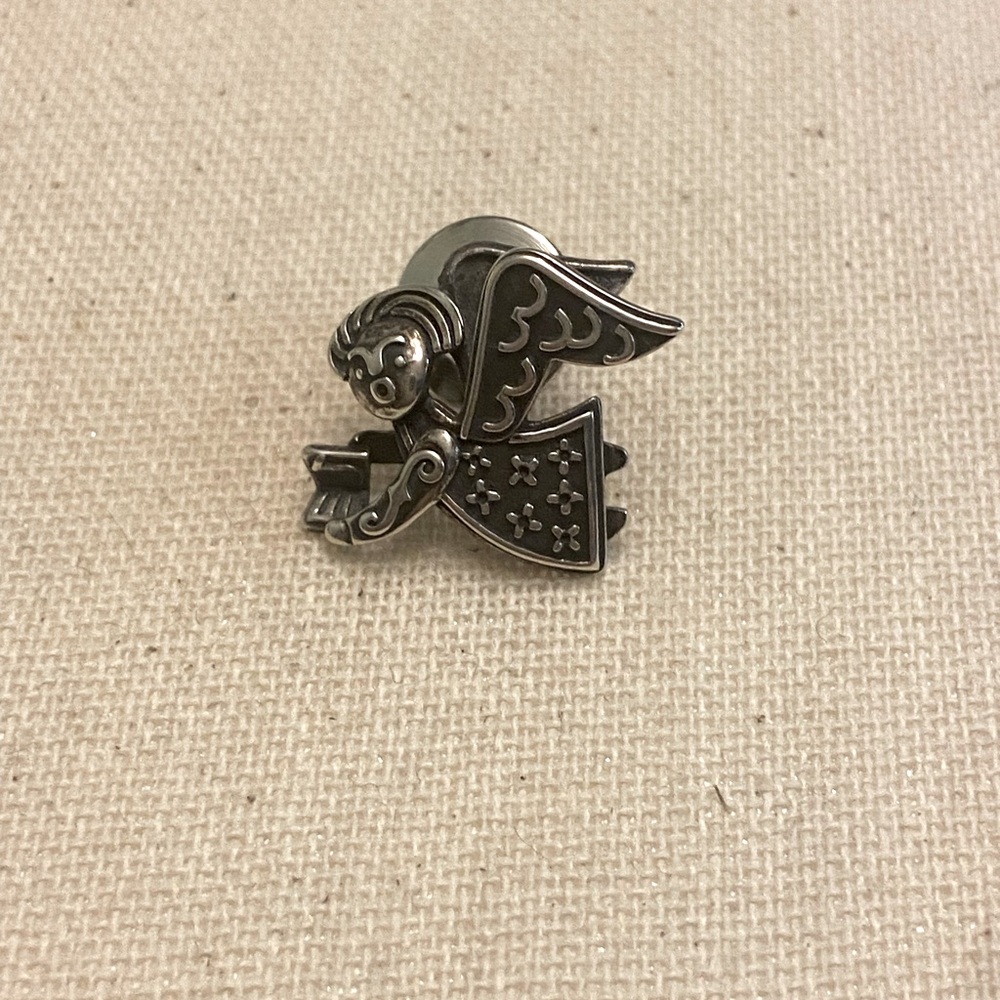 Retired James Avery singing Angel pin